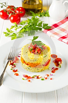 Arabic couscous with tomatoes and apricots