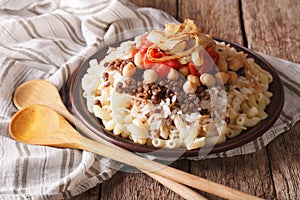 Arabic cuisine: kushari of rice, pasta, chickpeas and lentils cl