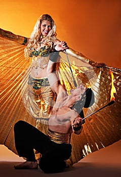 Arabic dancer with fire eater