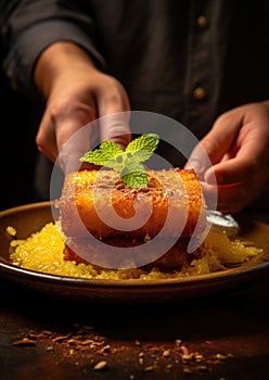 Arabic dessert Konafa or Knafeh with white cheese and pistachio