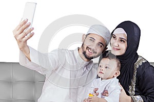 Arabic family taking selfie picture