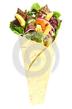 Arabic fast food with meat wrapped in a pita bread photo