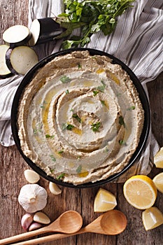Arabic food baba ghanoush close-up and ingredients. vertical top photo