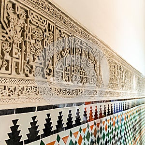 Arabic inscriptions on the wall of Royal Alcazar of Seville,Spain.