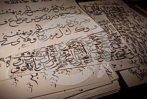 Arabic and Islamic calligraphy traditional khat practise in black ink.