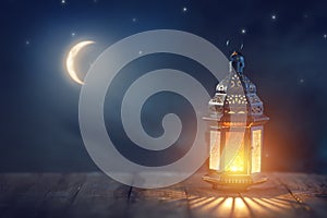 Arabic lantern with burning candle photo