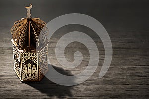 Arabic lantern on wooden backgrounds
