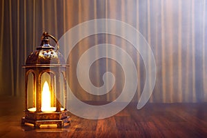 Arabic lantern on wooden floor with golden curtain, Ramadan kareem backgrounds