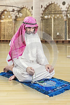 Arabic man dhikr in the mosque photo
