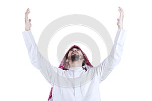 Arabic man praying while raise hands