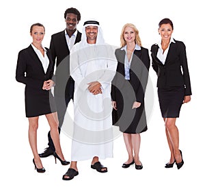 Arabic Man Standing With Businesspeople