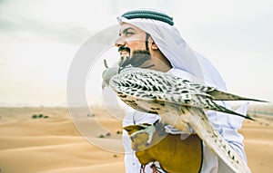 Arabic man with traditional emirates clothes photo