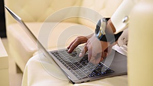 Arabic man working on laptop , Saudi businessman , Arab social media working , Arab traditional robe clothing lifestyle