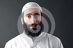 Arabic Muslim man with beard portrait photo