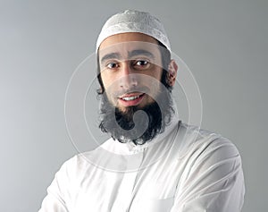 Arabic Muslim man with beard smiling