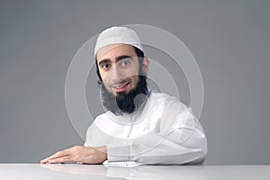 Arabic Muslim man with beard smiling photo