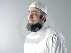 Arabic Muslim man with beard smiling photo