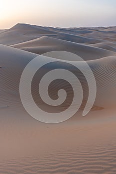 Arabic sand desert during sunrise photo