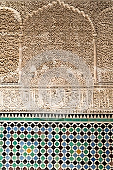 Arabic script on walls of the Bou Inania Madarsa in Fes, Morocco.