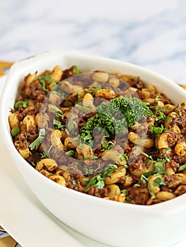 ARABIC STYLE PASTA WITH GREEN PEAS Served in dish isolated on table closeup top view of italian food