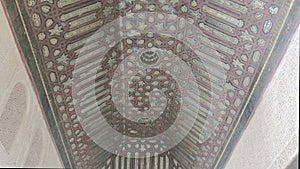 Arabic-style vaulted ceiling in the Nasrid palaces of the Alhambra in the city of Granada, Spain