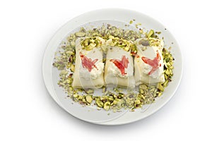 Arabic sweets with cheese `Halawa bil jubn` or `Halawe bl jebn` with Cream keshta