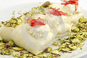 Arabic sweets with cheese `Halawa bil jubn` or `Halawe bl jebn` with Cream keshta