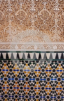 Arabic tiles on the walls of the Nasrid Palace at the Alhambra in Spain