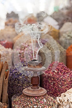 Arabic traditional incense bukhoor agar wood burner in with smoke, Ramadan and Eid occasions