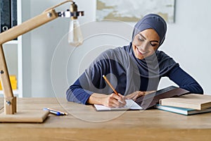 Arabic woman drawing a sketch