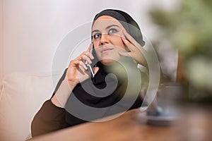 Arabic woman with a phone