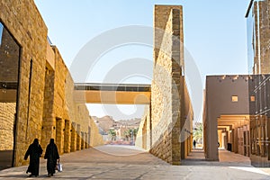 Arabic women walking in the Diraiyah, also as Dereyeh and Dariyya, a town in Riyadh, Saudi Arabia, was the original home of the photo
