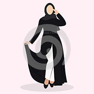 Arabic young woman in hijab, Muslim girl in fashion traditional black dress abaya from UAE or Saudi Arabia posing, facaless islami photo