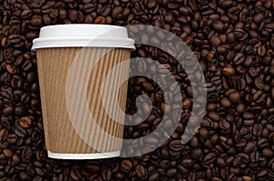 Arabica coffe aroma and takeout beverages concept with generic recyclable brown cardboard and paper cup with white plastic lid on