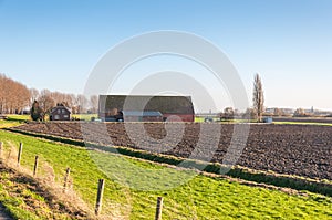 Arable farm and barn in autumn