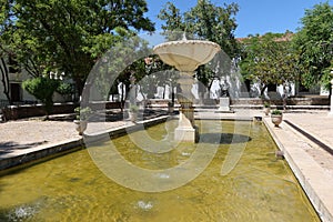 Water pond in the Dona Elvira square in Aracena, Huelva, Spain photo