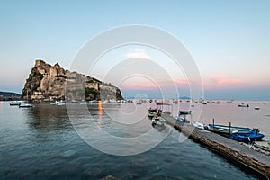 Aragonese castle on the sunset. Ischia, Italy. Copy space
