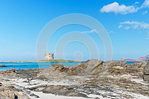 Aragonese tower by a turquoise sea