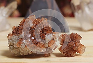 Aragonite Carbonate Crystals With Pyramid in Background