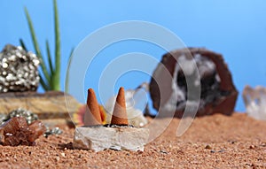 Aragonite Crystal With Incense Cones on Australian Red Sand