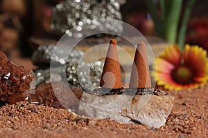 Aragonite Crystal With Incense Cones on Australian Red Sand