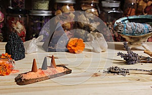 Aragonite Crystal With Incense and Stone Pyramid on Meditation Altar