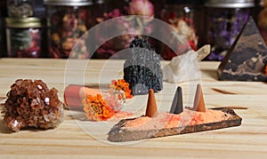 Aragonite Crystal With Incense and Stone Pyramid on Meditation Altar