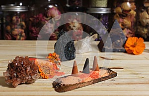 Aragonite Crystal With Incense and Stone Pyramid on Meditation Altar