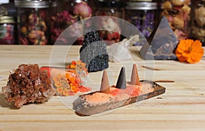 Aragonite Crystal With Incense and Stone Pyramid on Meditation Altar