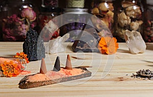 Aragonite Crystal With Incense and Stone Pyramid on Meditation Altar