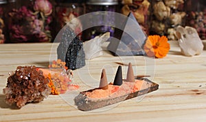 Aragonite Crystal With Incense and Stone Pyramid on Meditation Altar