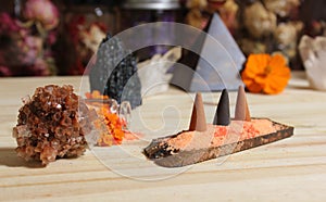 Aragonite Crystal With Incense and Stone Pyramid on Meditation Altar