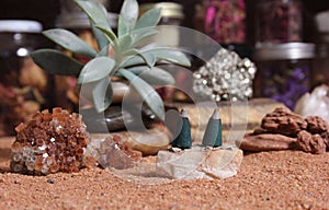 Aragonite Crystals With Incense Cones on Australian Red Sand