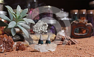 Aragonite Crystals With Incense Cones on Australian Red Sand